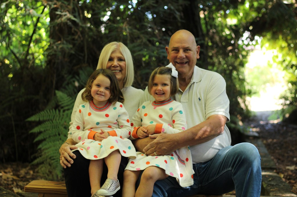 Family photo of four.